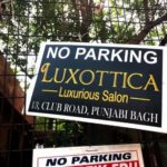 Sunpack Sheet Advertising - No Parking - Luxottica Salon